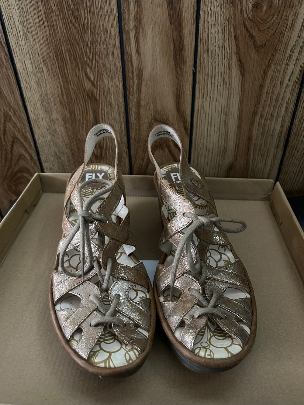 Fly London Metallic Rose Gold Lace-Up Woven Sandals